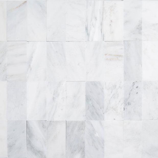 Carrara White 3 x 6 tuuman hiottu marmoriseinälaatta, 6,98 dollaria / neliömetri. ft; homedepot.com.