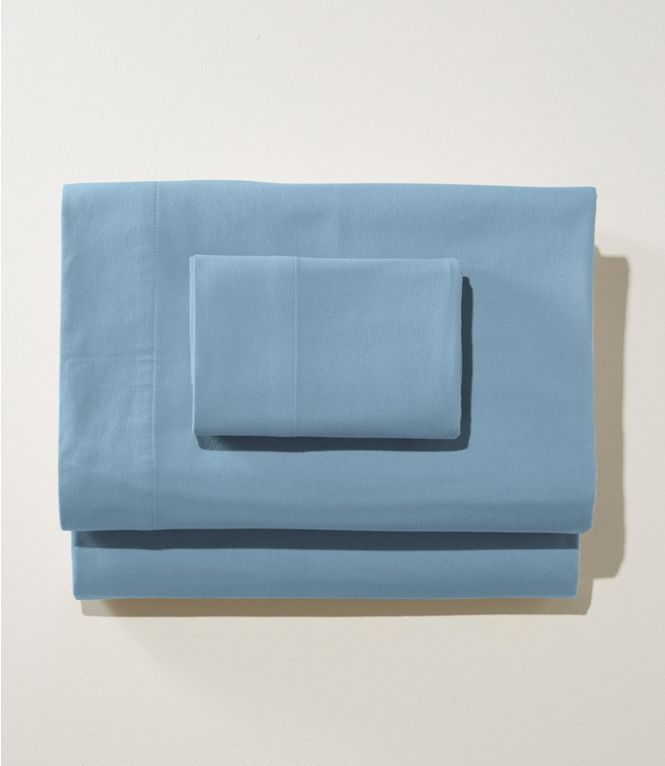 Hoe maak je een gezellig bed, blauwe flanellen lakens